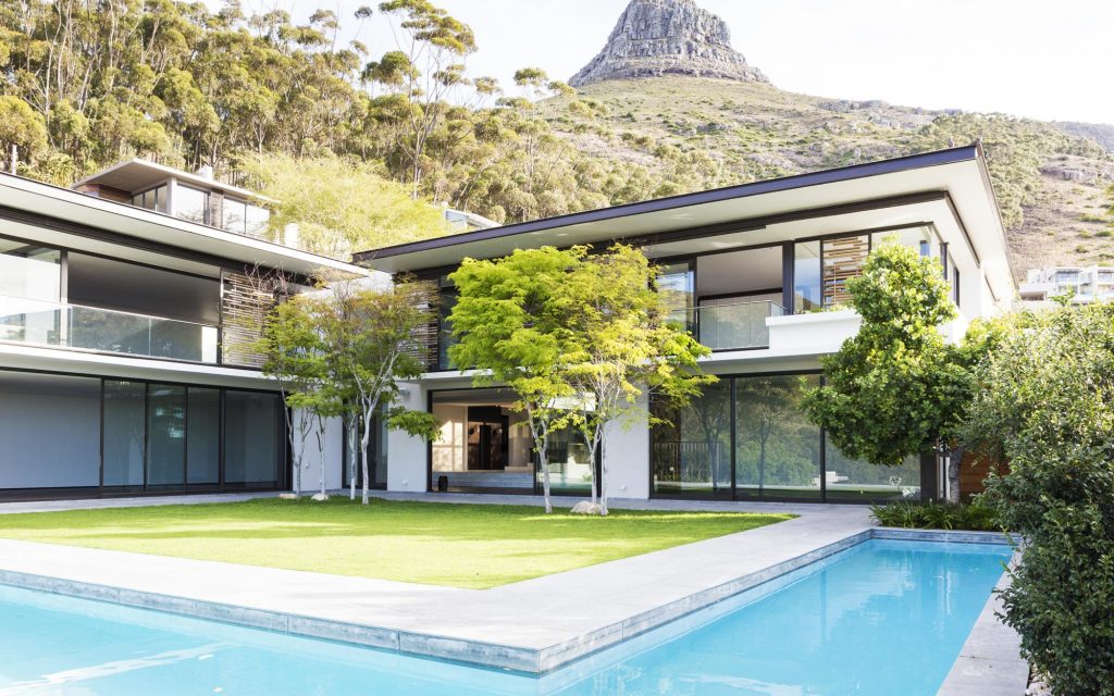 villa in front of mountain lions head
